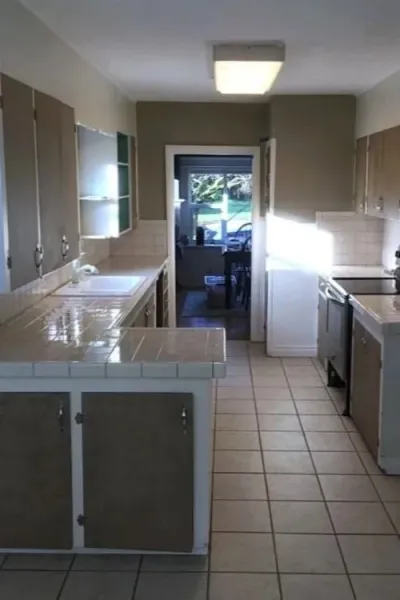 Before kitchen remodel with original galley layout in Brooklyn SE Portland home
