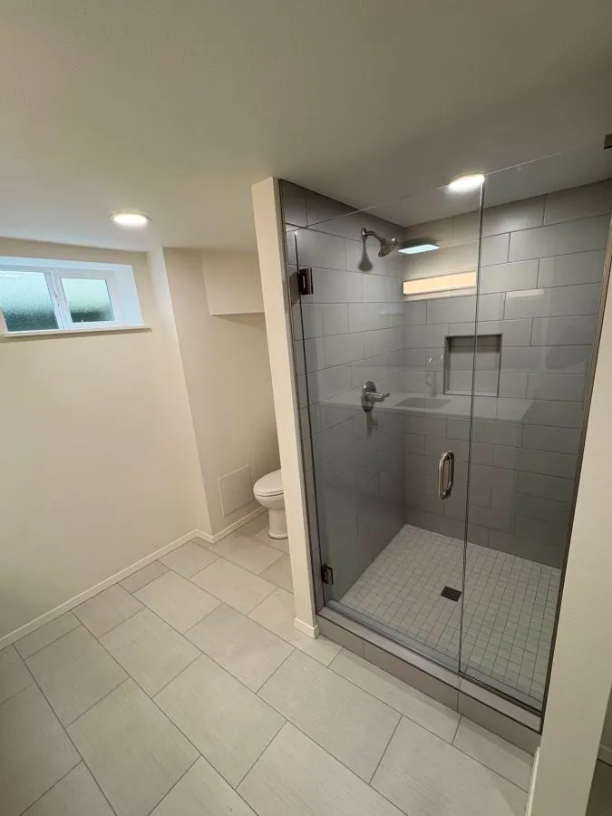 Basement remodel with bathroom walk-in shower and glass enclosure in Mt. Tabor southeast Portland home