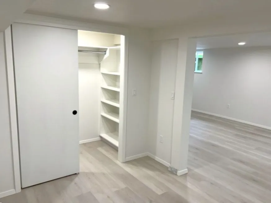Basement remodel with flexible living space and closet in Mt. Tabor, SE Portland home
