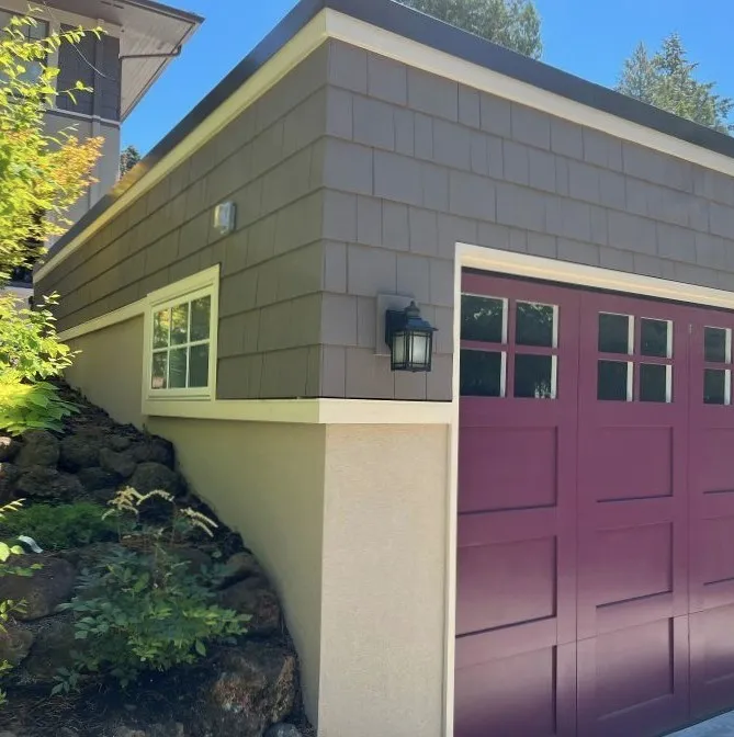 Garage addition with new structure and exterior finish in Portland home